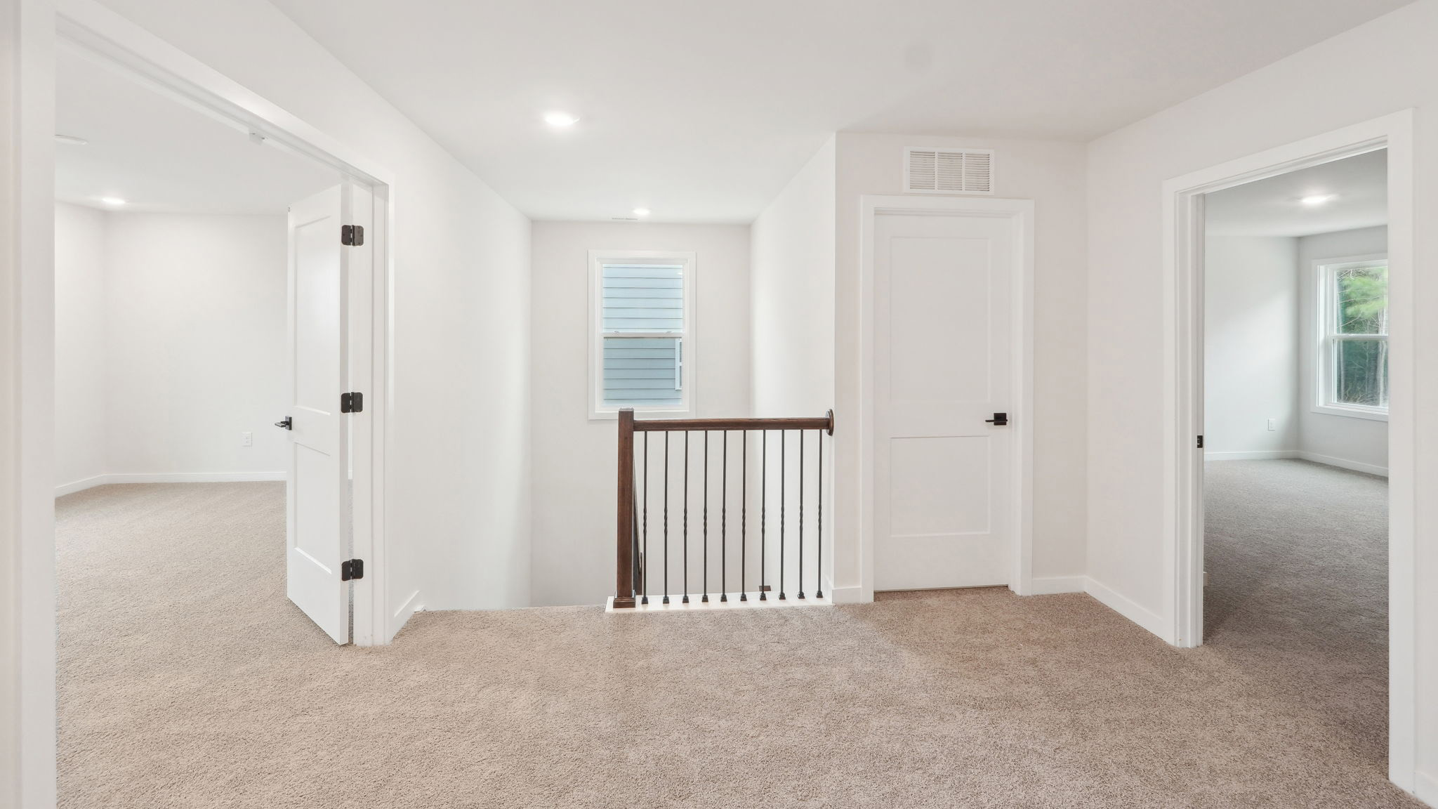upstairs carpeted loft area