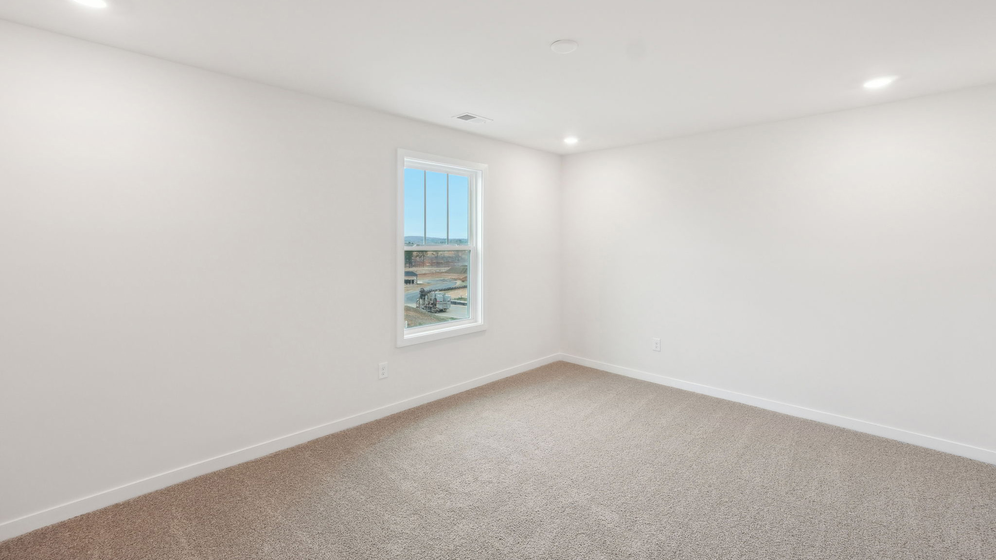 upstairs carpeted loft area