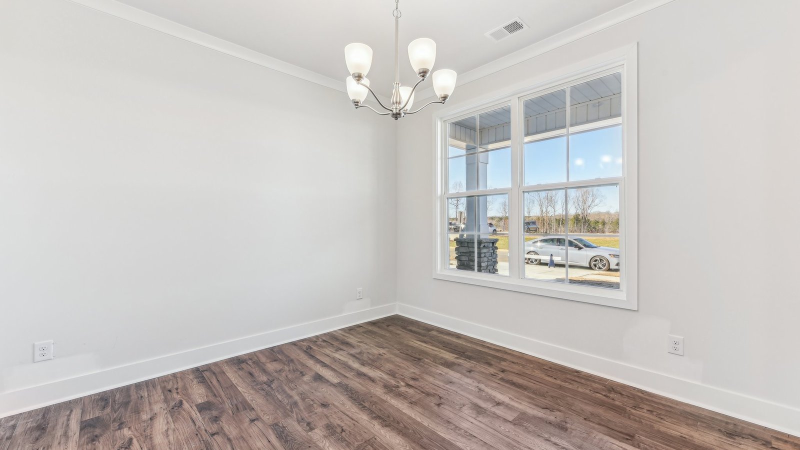office flex space off of foyer with large window and french doors