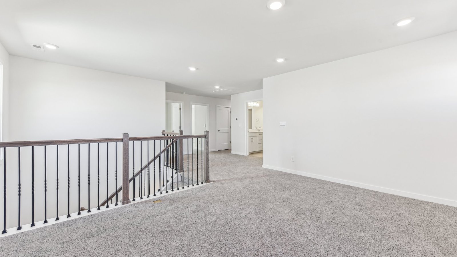 upstairs carpeted loft area