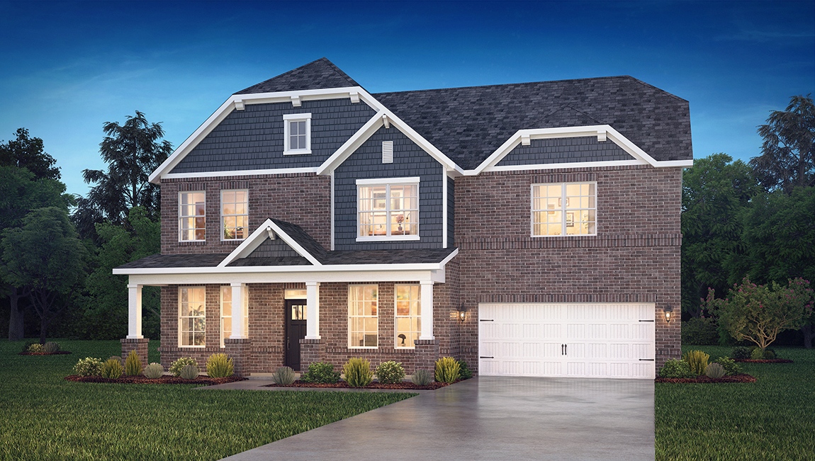 Norman front exterior with siding, brick and two car garage