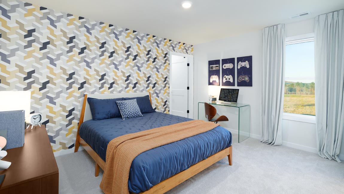 Large carpeted bedroom with three windows