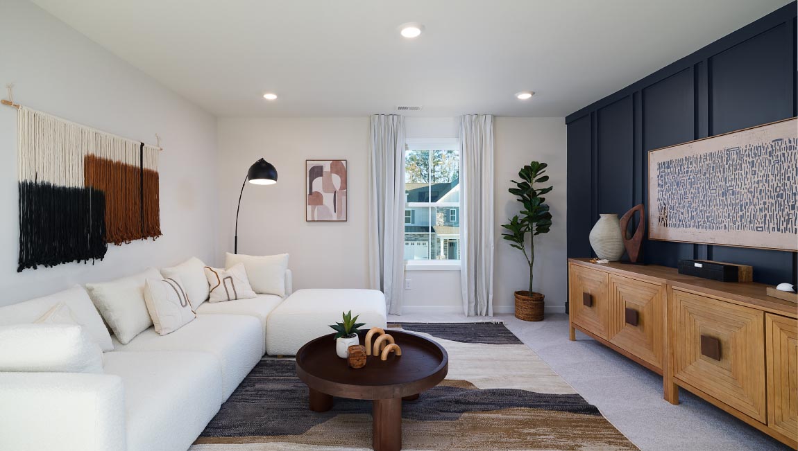 upstairs loft area, carpeted with two windows