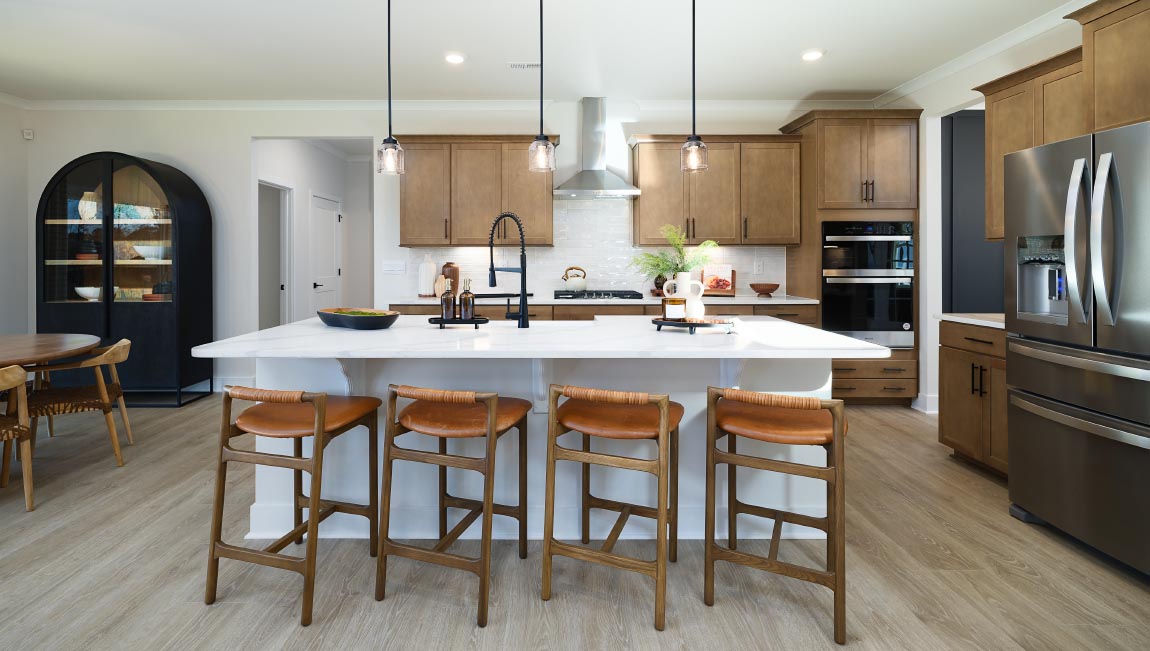 Kitchen and island, white counters and cabinets