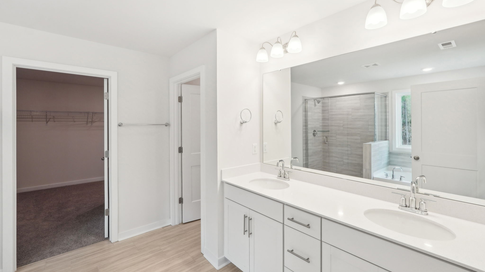 Primary bathroom with standing glass shower