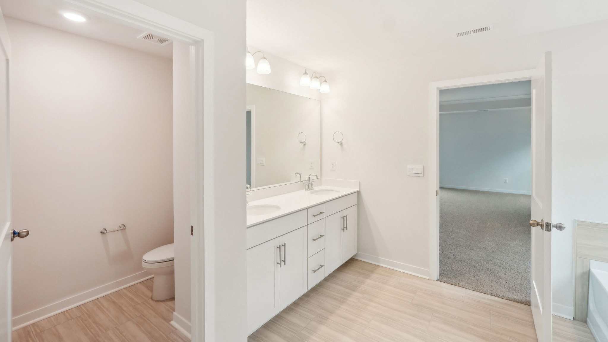 Primary bathroom with standing glass shower