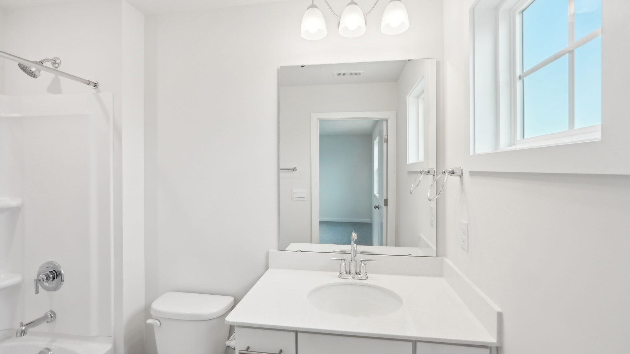 Bathroom with bathtub and shower combination