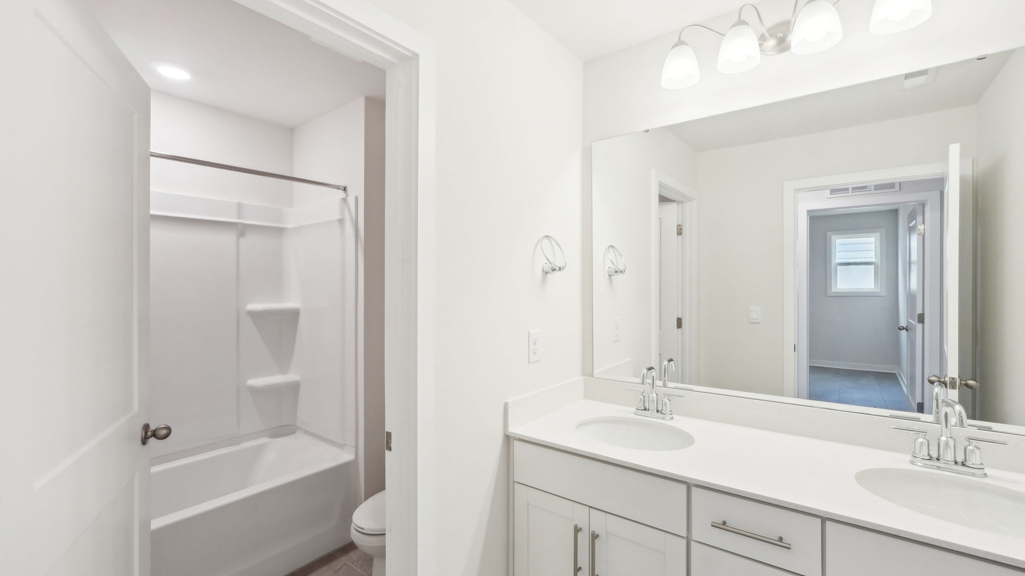 Bathroom with bathtub and shower combination