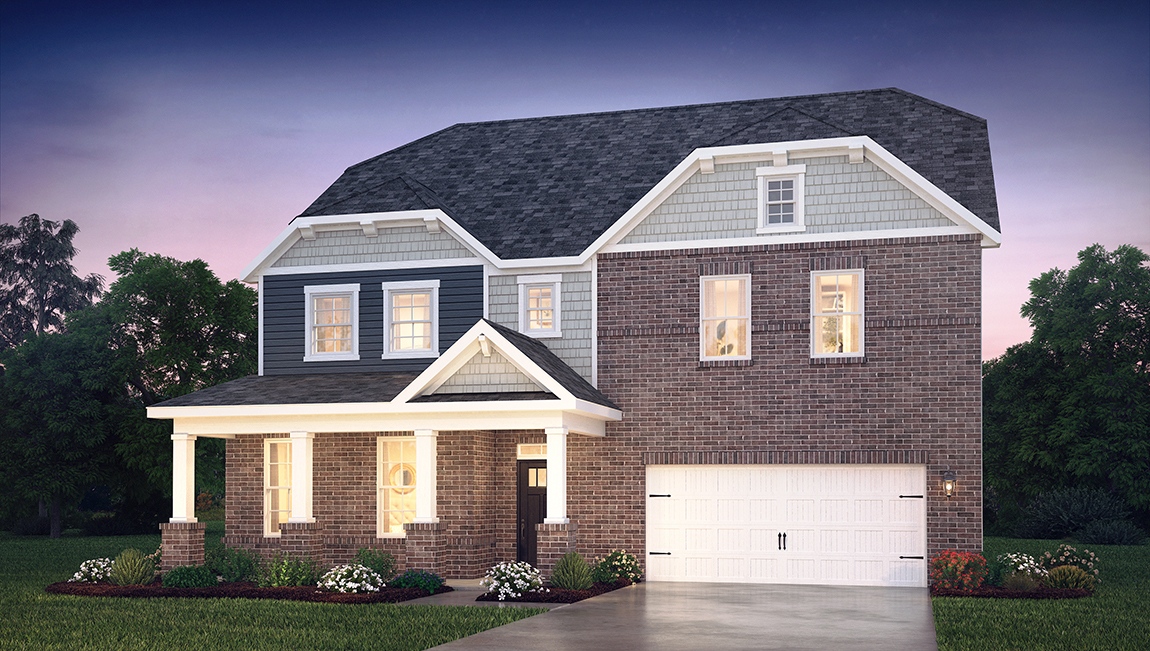 Wylie front exterior with beige siding, brick and two car garage