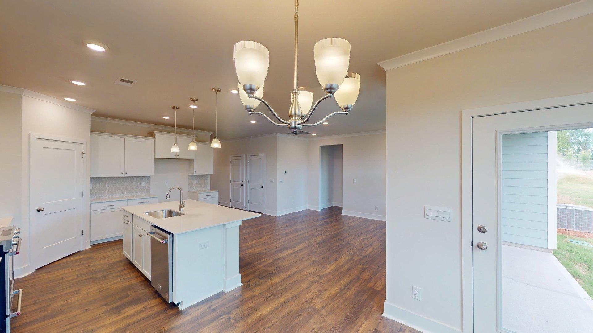 Dining area off the kitchen with large windows
