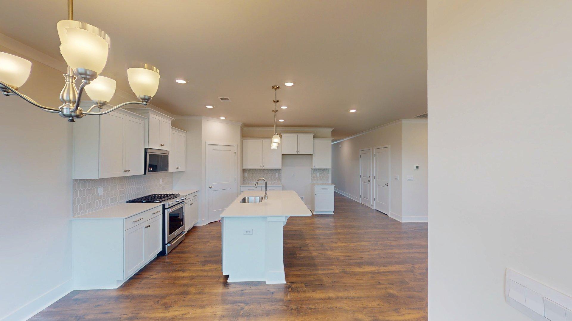 Dining area off the kitchen with large windows