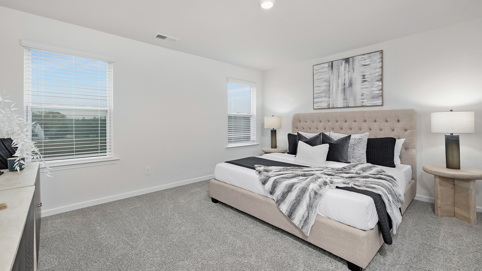 Primary bedroom with windows