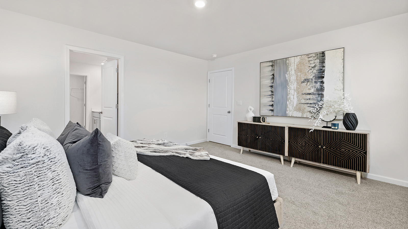 Primary bedroom with windows