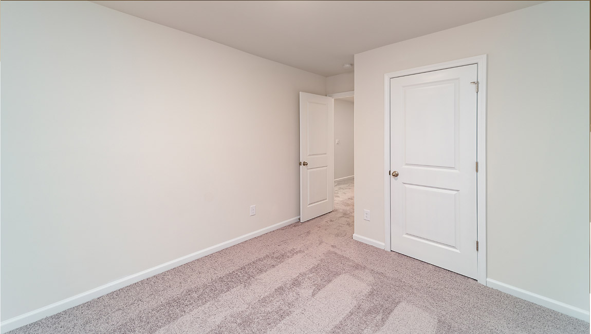 Carpeted bedroom