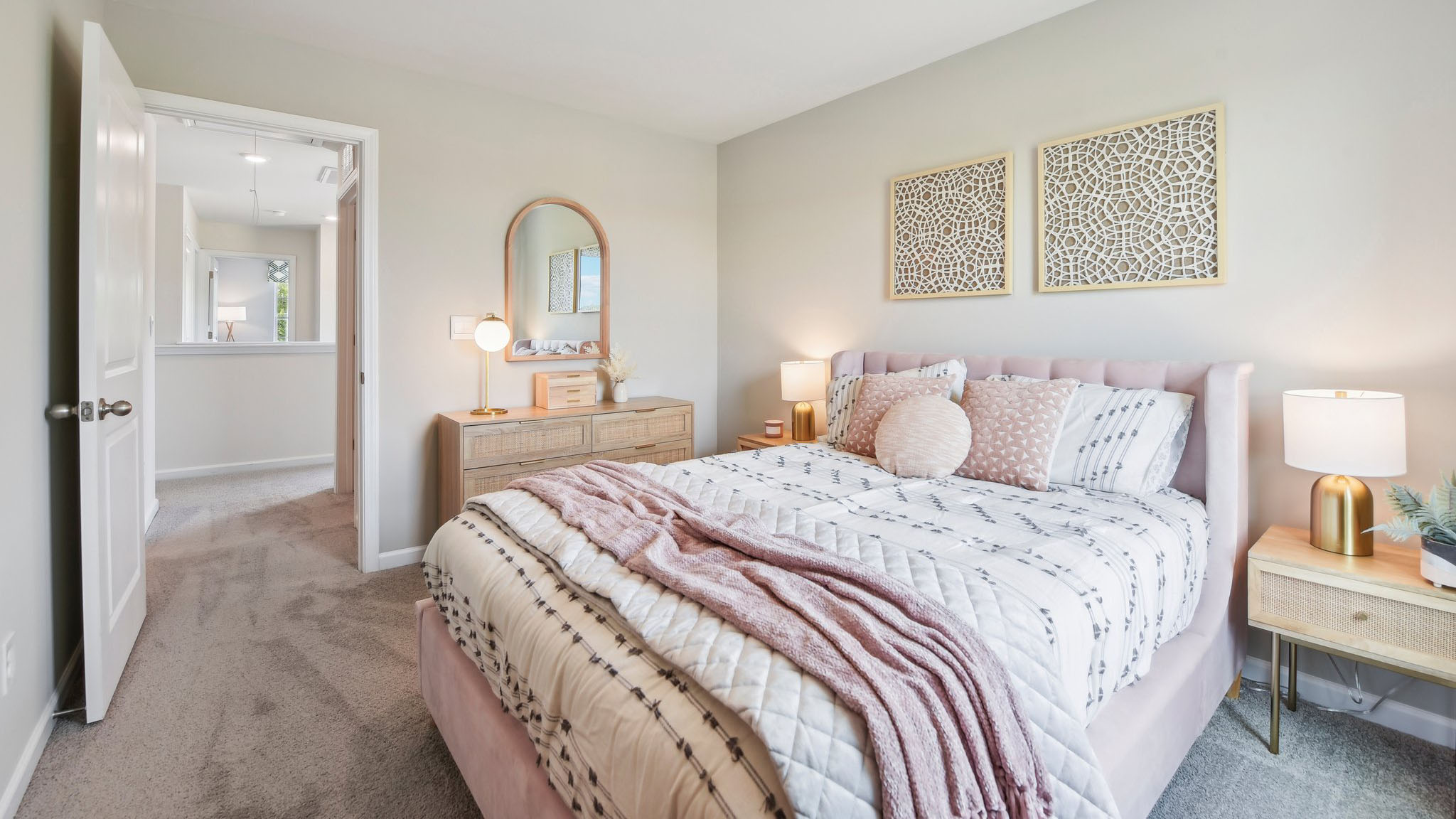 Carpeted bedroom with large windows
