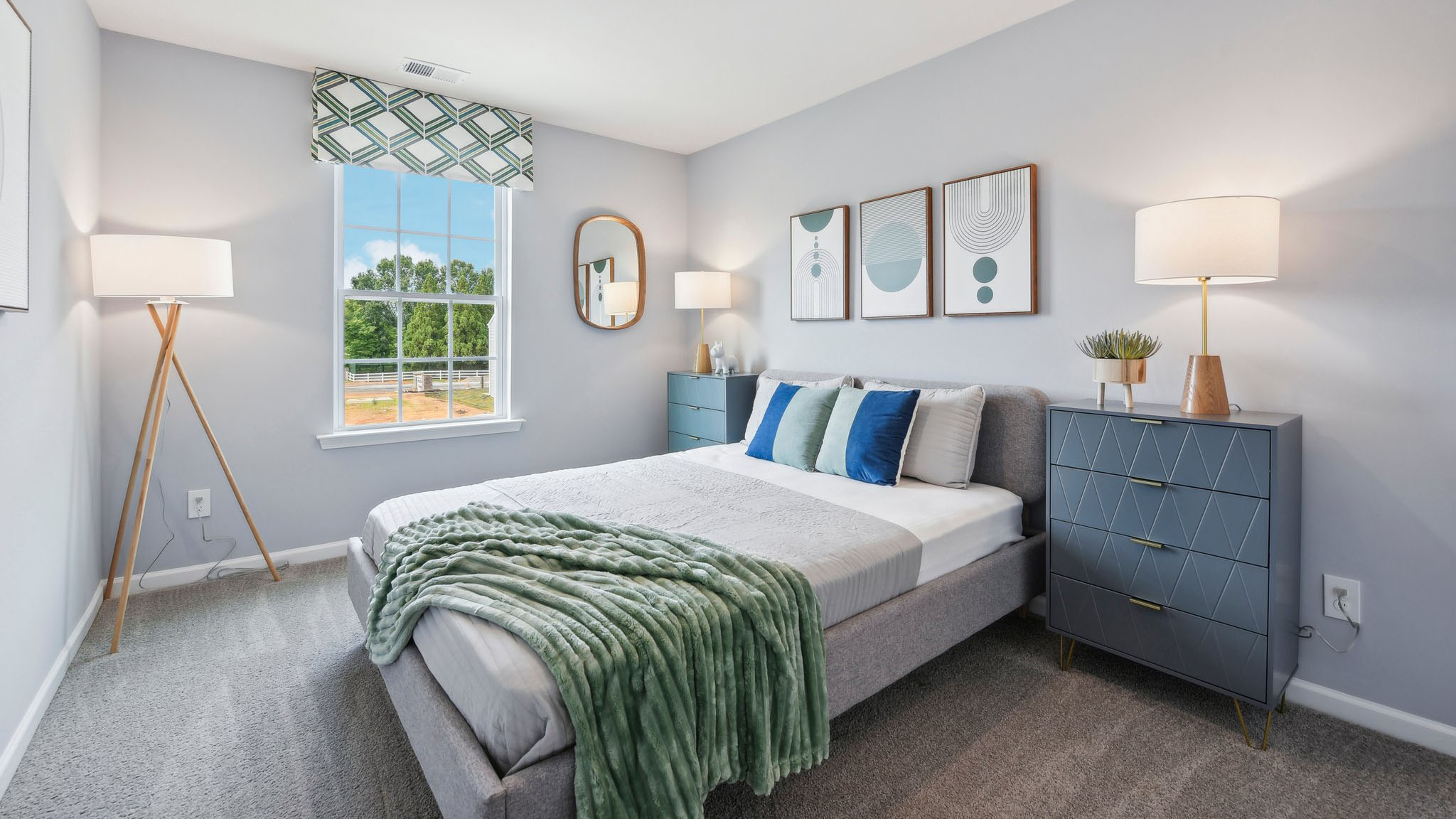 Carpeted bedroom with large windows