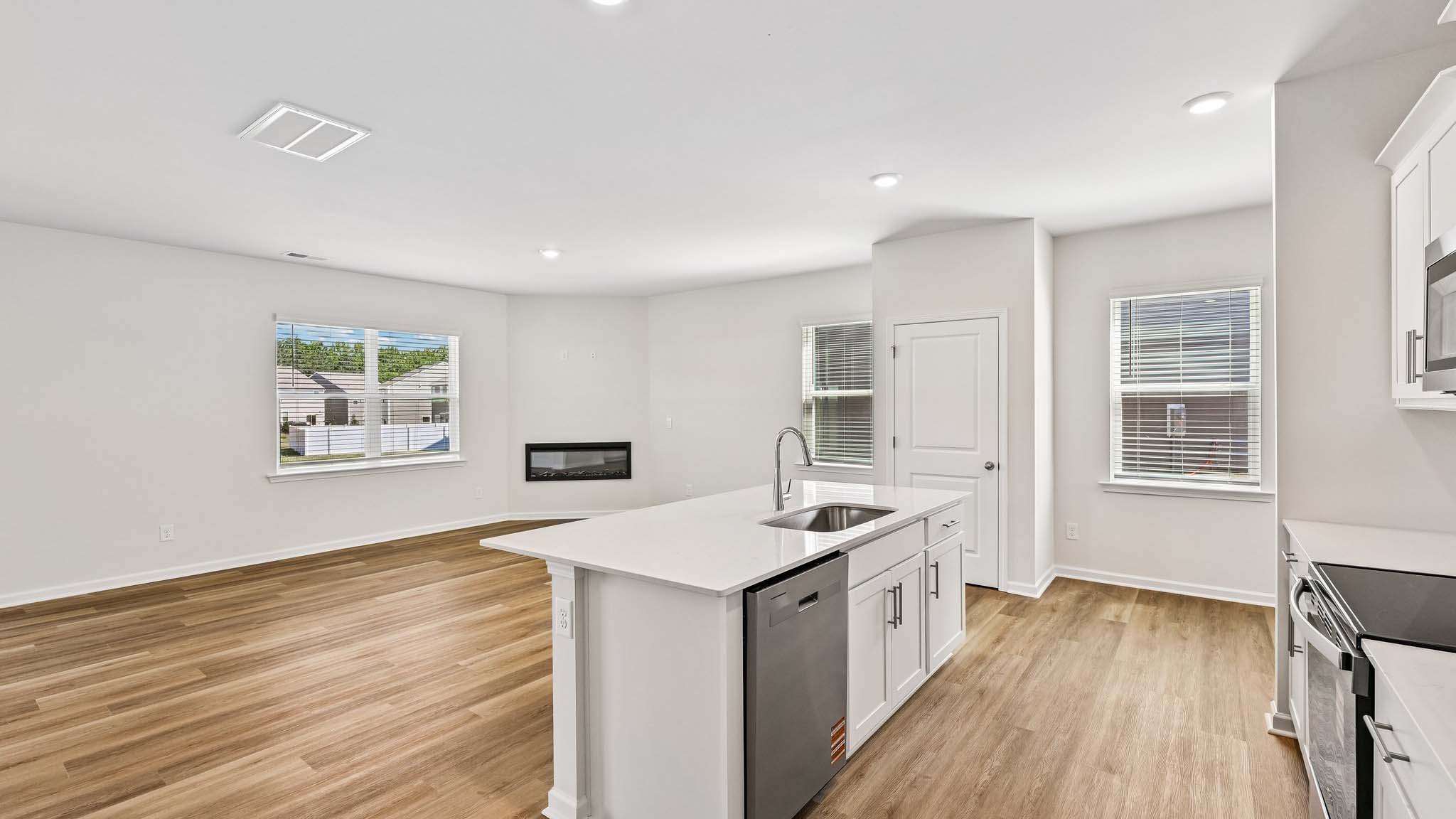 kitchen and island with stainless steel appliances