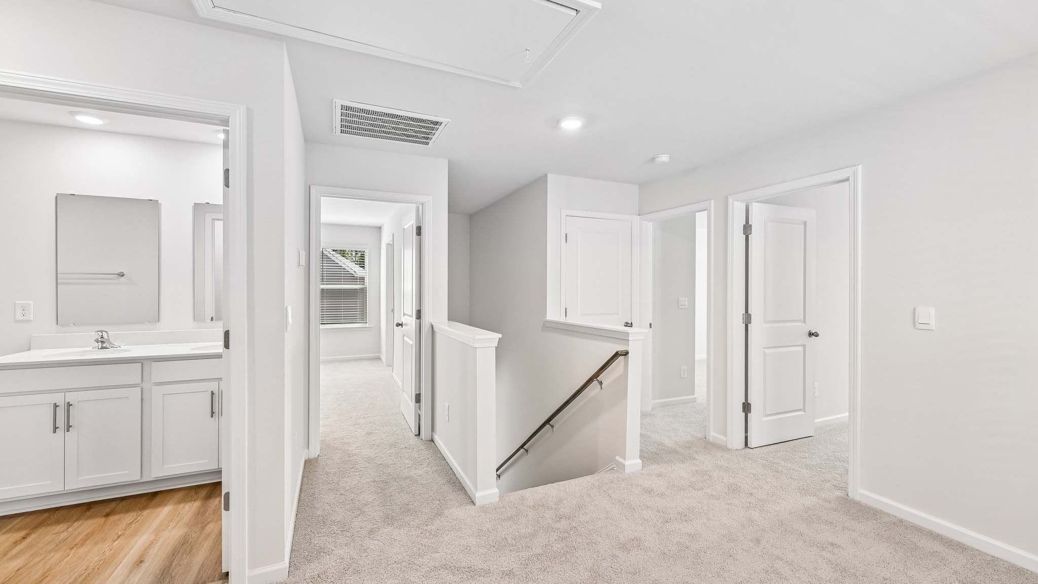 carpeted upstairs loft
