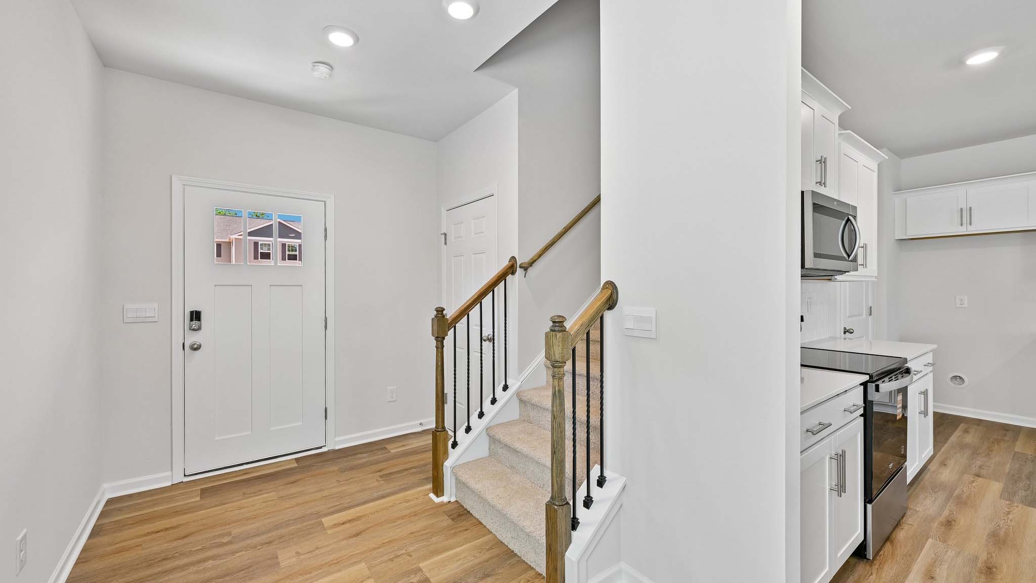 welcoming foyer with staircase