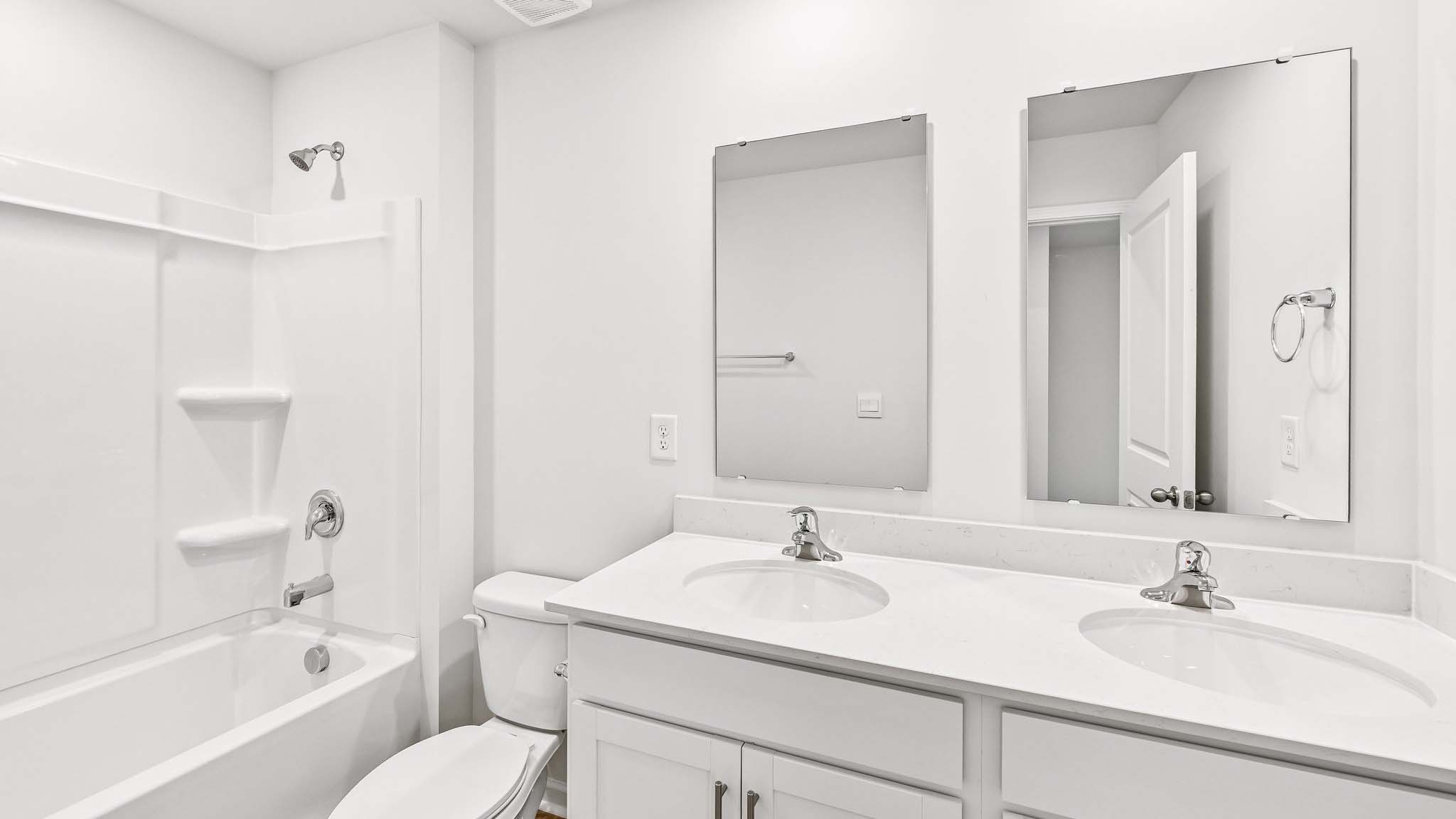 bathroom with bathtub shower combination