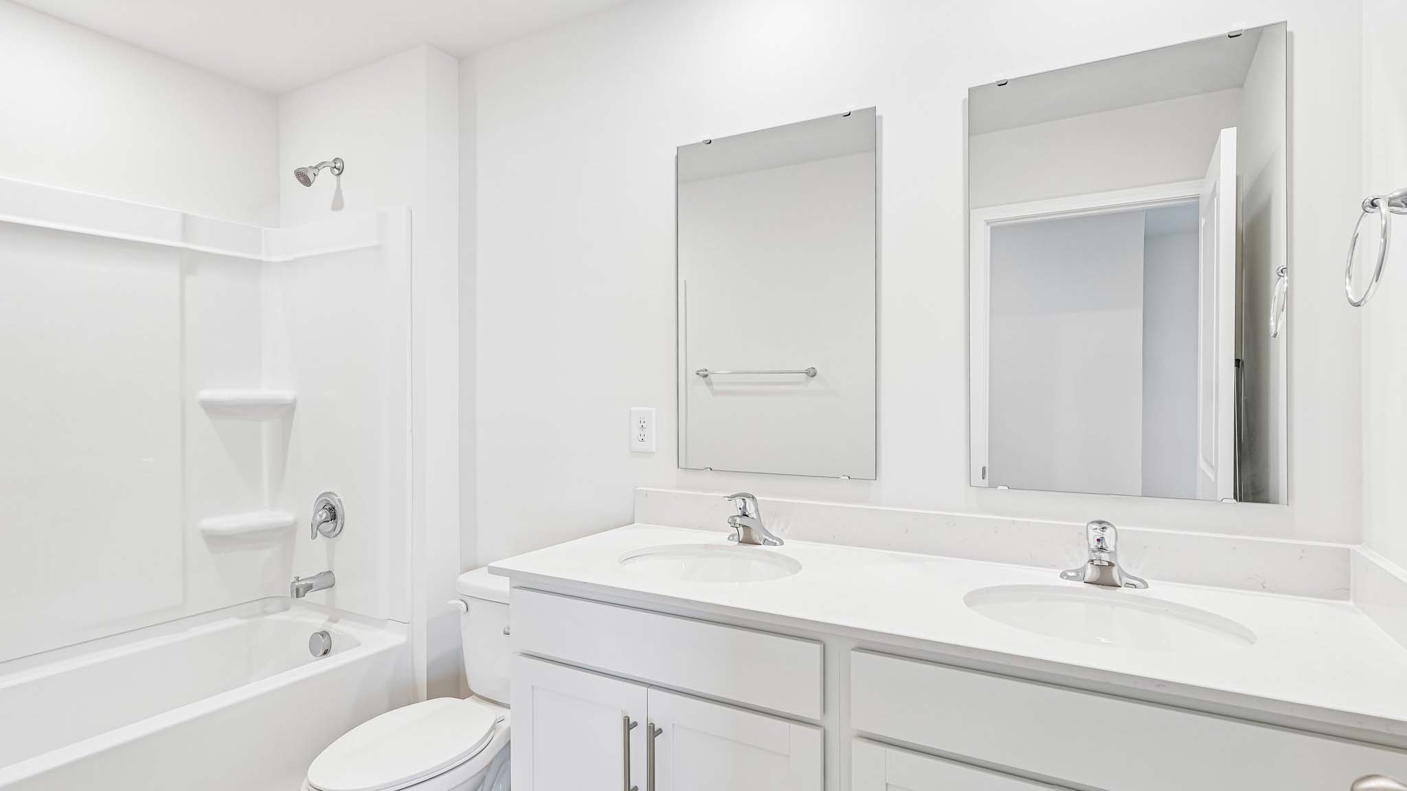 bathroom with bathtub shower combination