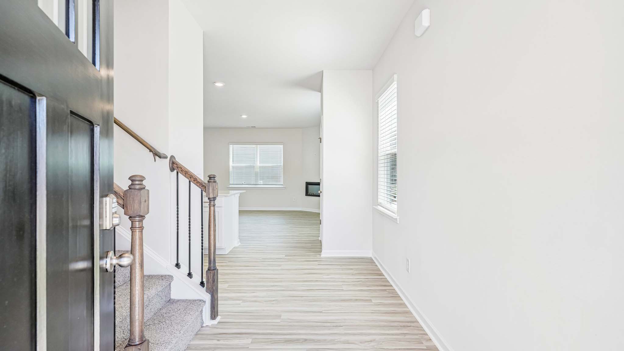 welcoming foyer with staircase