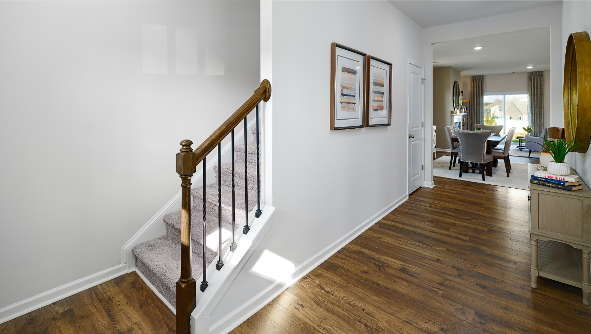 Welcoming foyer view of staircase