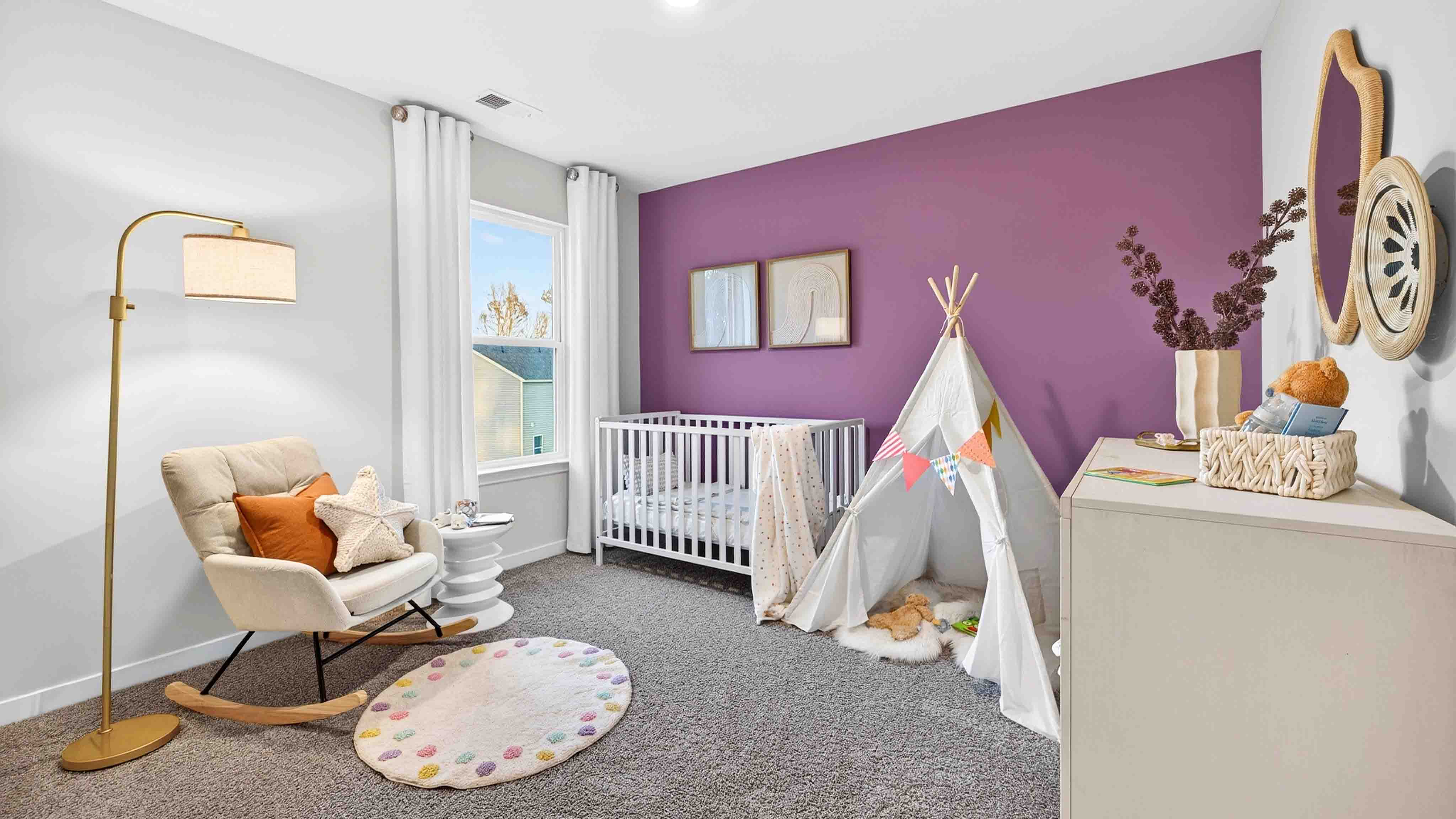 Carpeted bedroom with large window