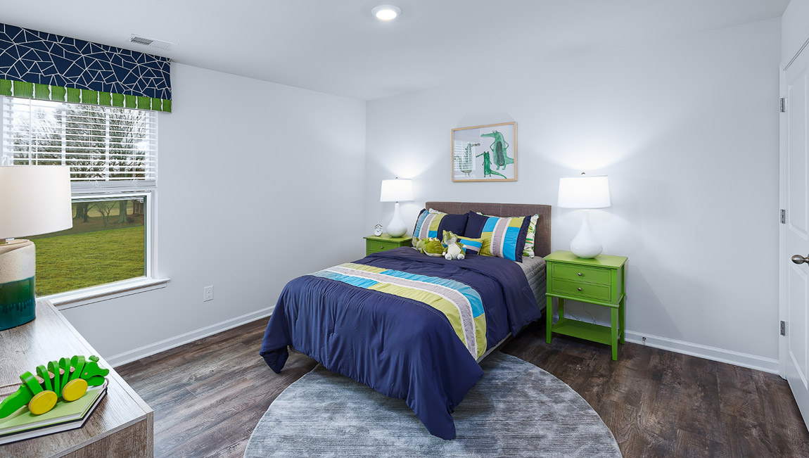 Bedroom with wood floor, and large window