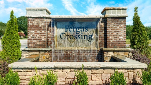Fergus Crossing front of community monument
