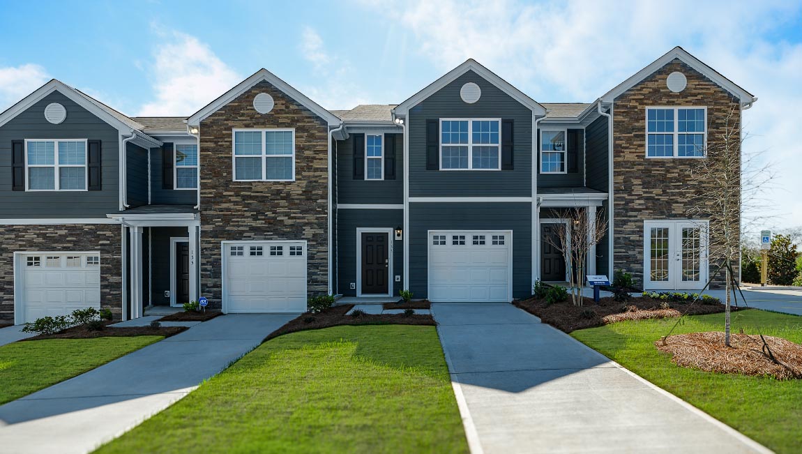 Maywood front exterior with stone, siding, and one car garage