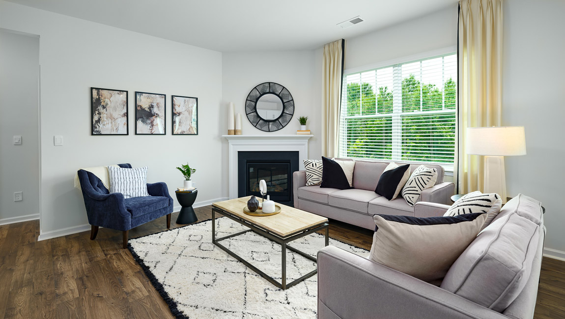 Living room space with windows