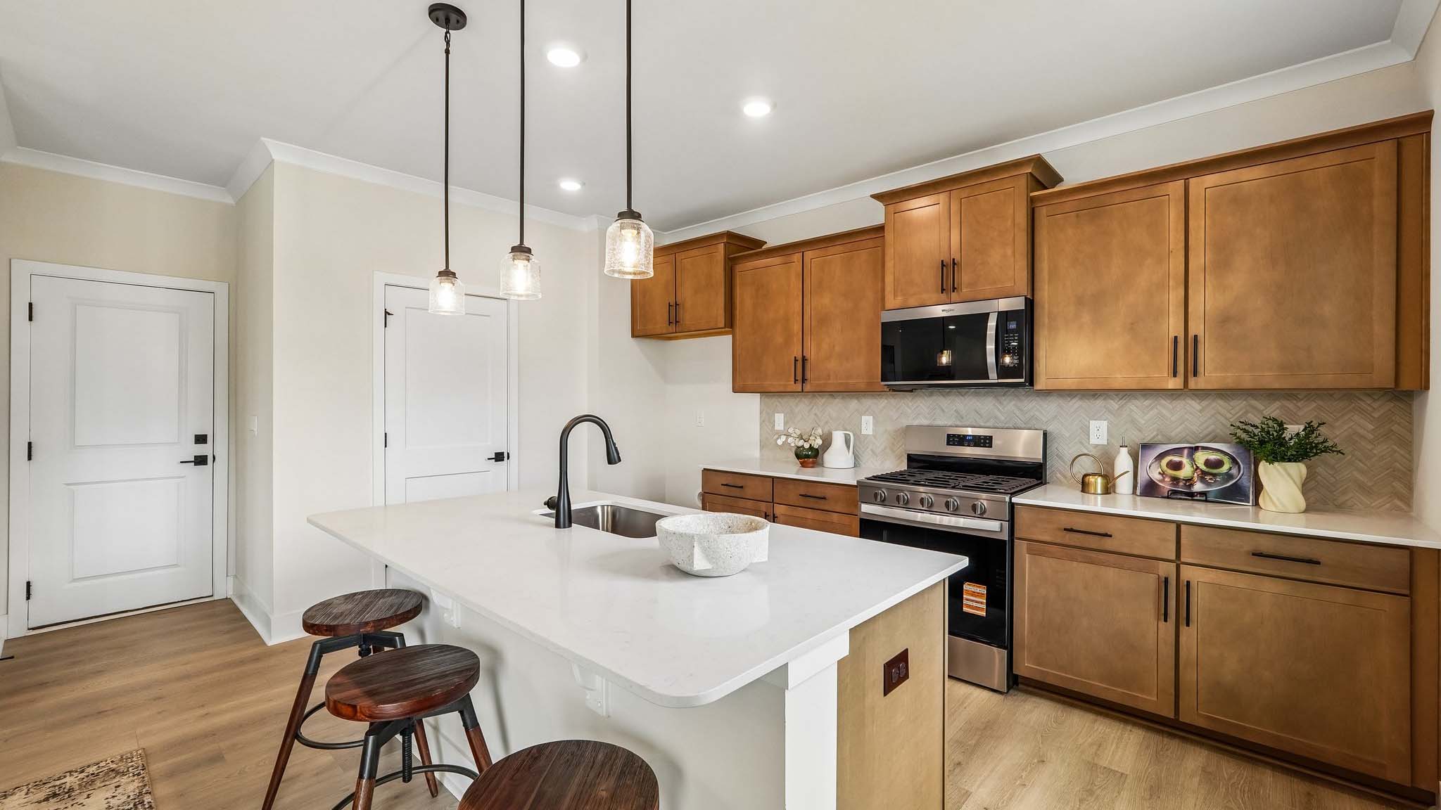 Kitchen and island with windows