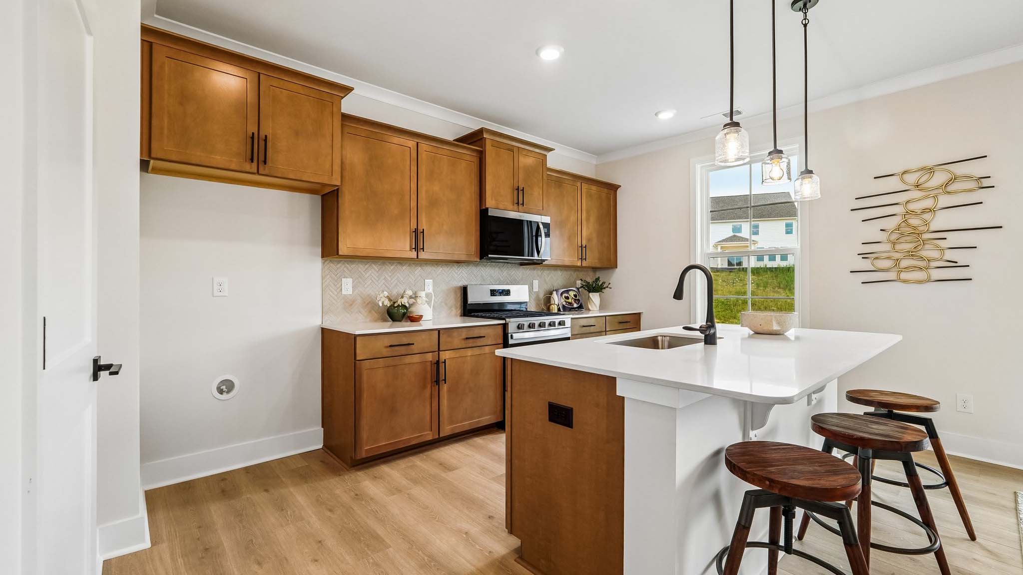 Kitchen and island with windows