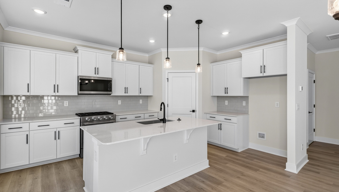 Kitchen and island with windows