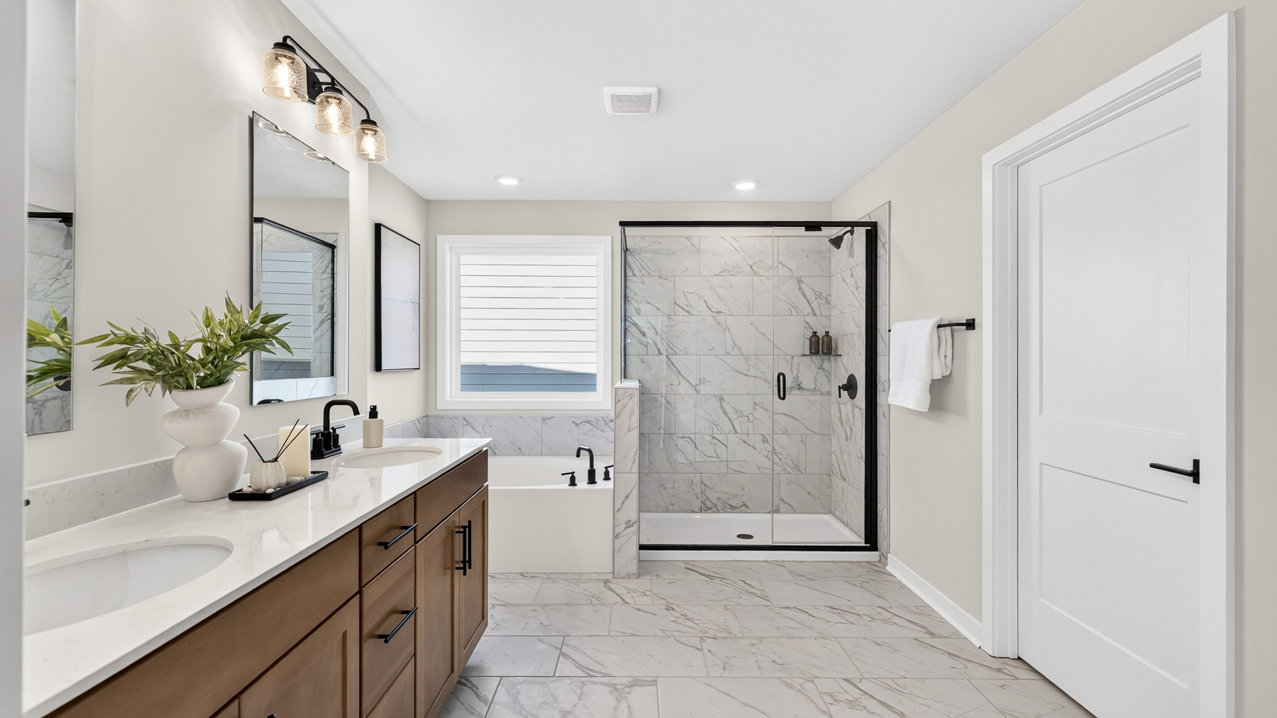 Primary bathroom with standing glass shower