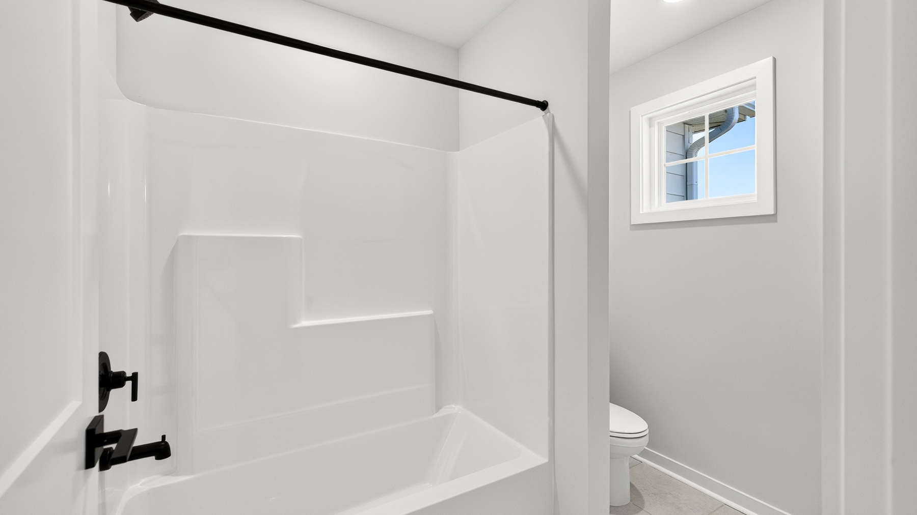 Bathroom with tub shower combination