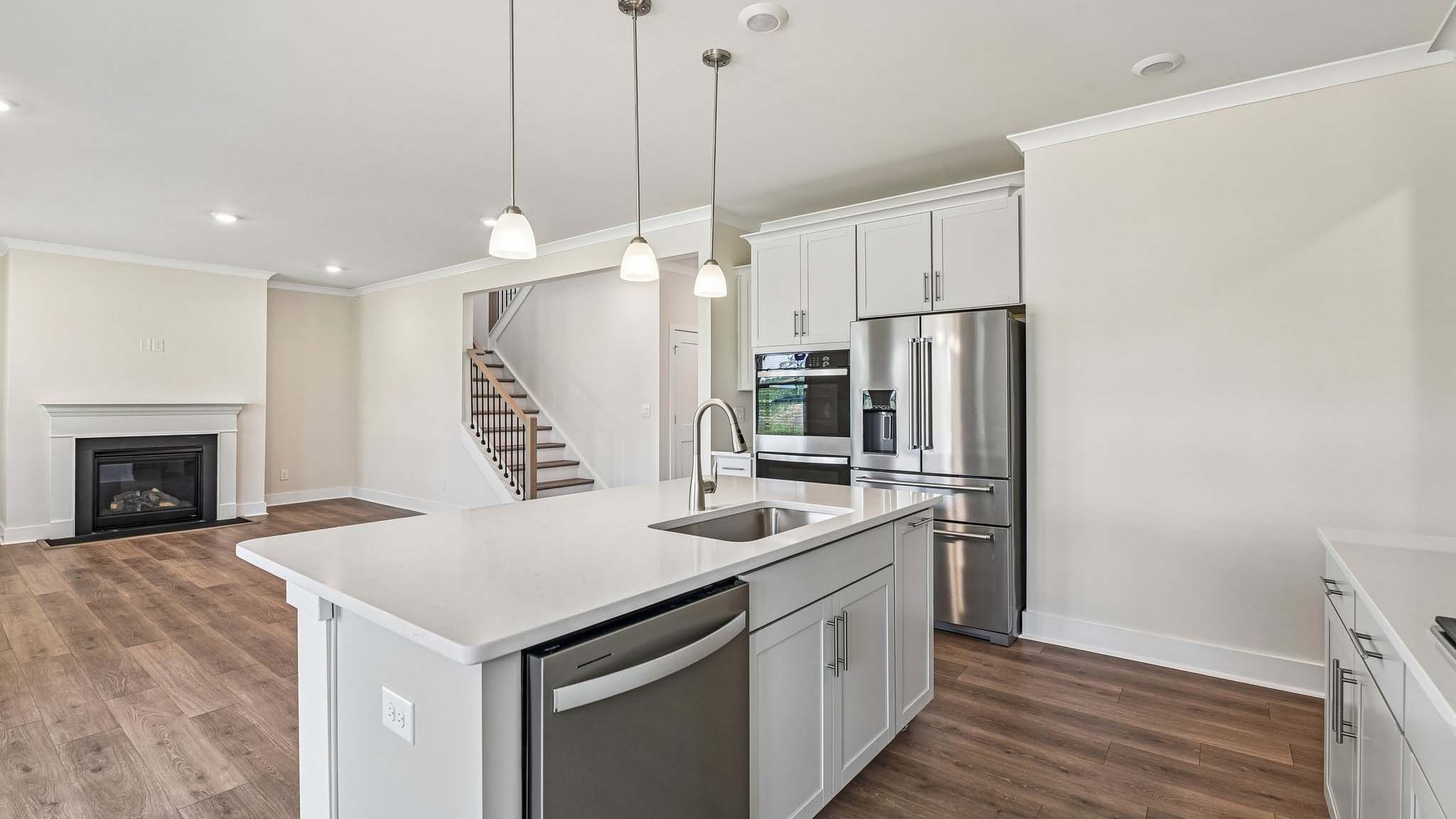 Kitchen and island with stainless steel appliances and lots of cabinet space
