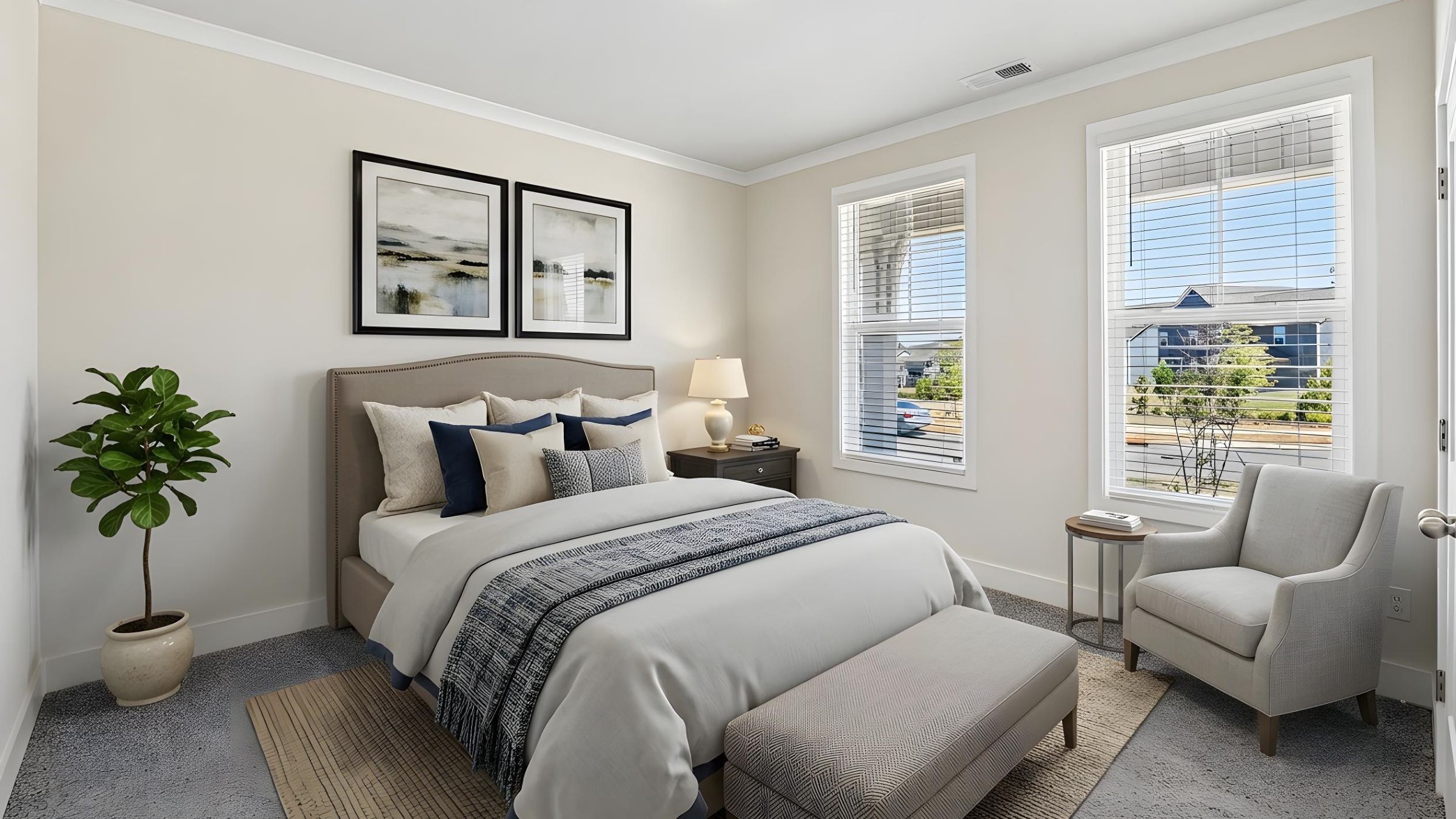 Carpeted bedroom with windows