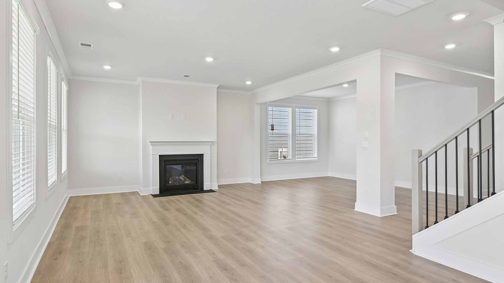 Living room with windows and fireplace