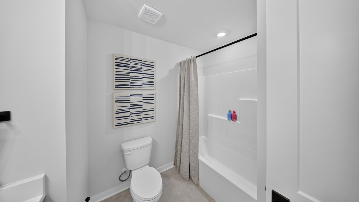 Bathroom with bathtub and shower combination