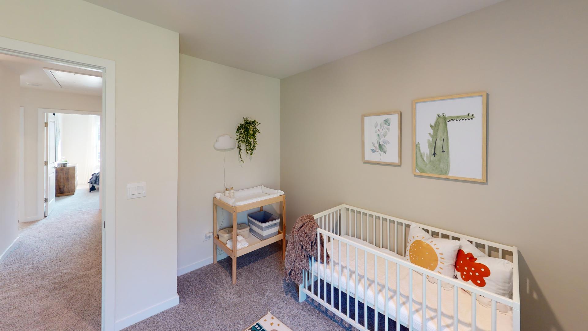 Carpeted bedroom with windows