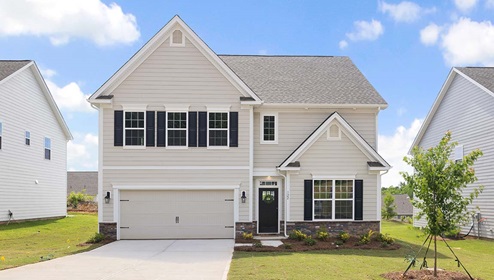 Summit front exterior with siding and two car garage