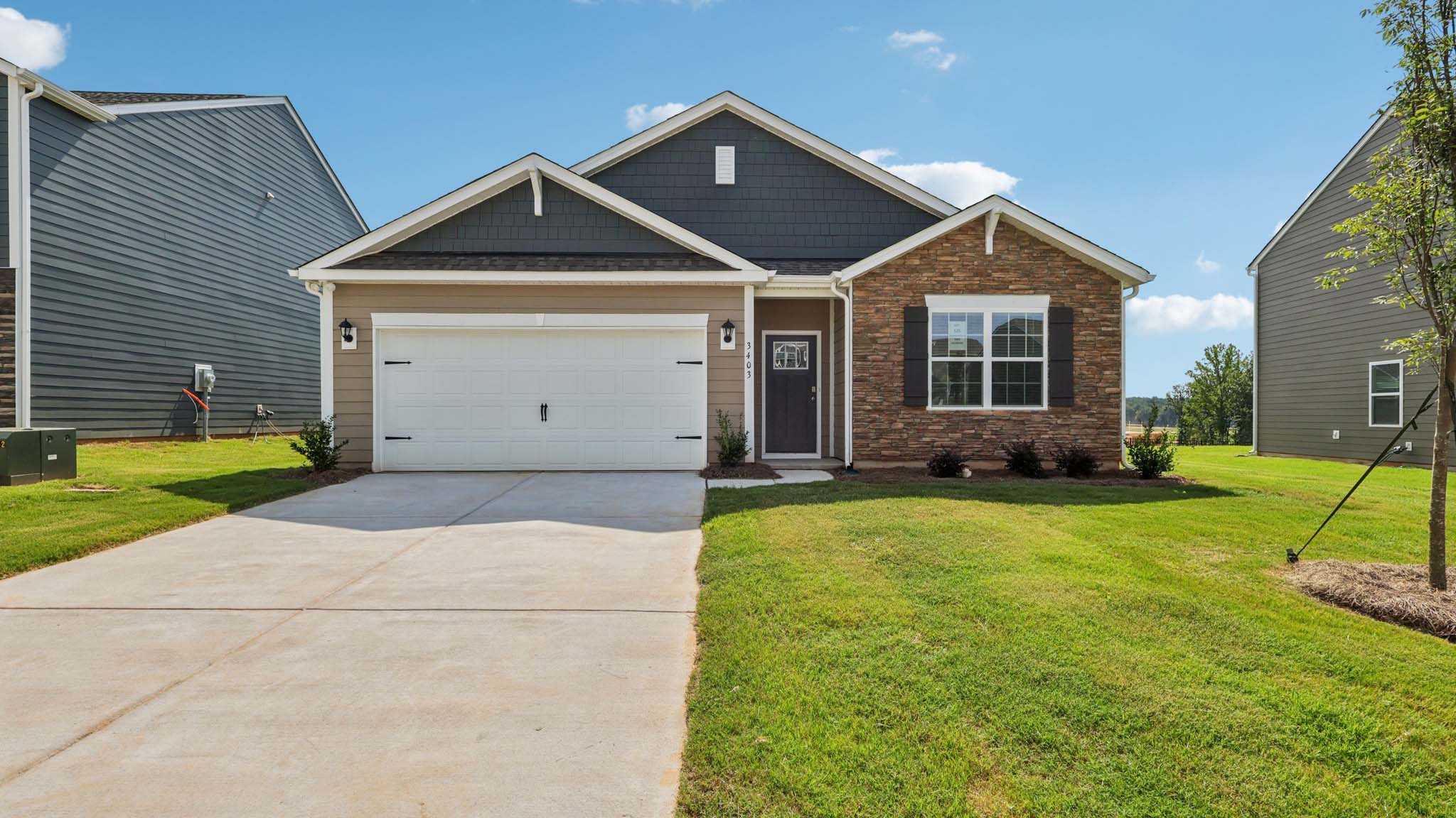 Cali front exterior with two car garage