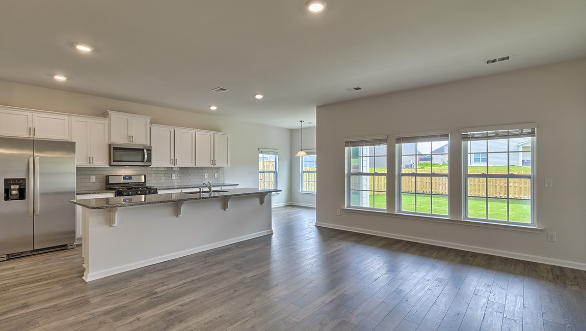 Living room area with windows