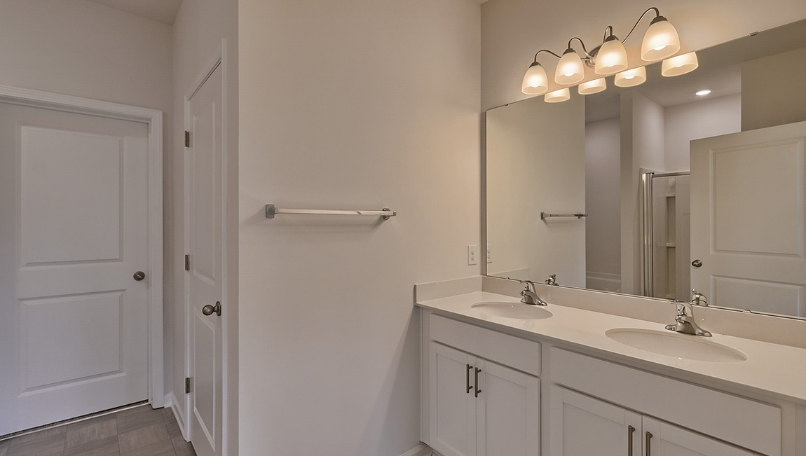 Primary bathroom with standing glass shower