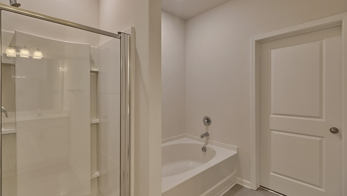 Primary bathroom with standing glass shower