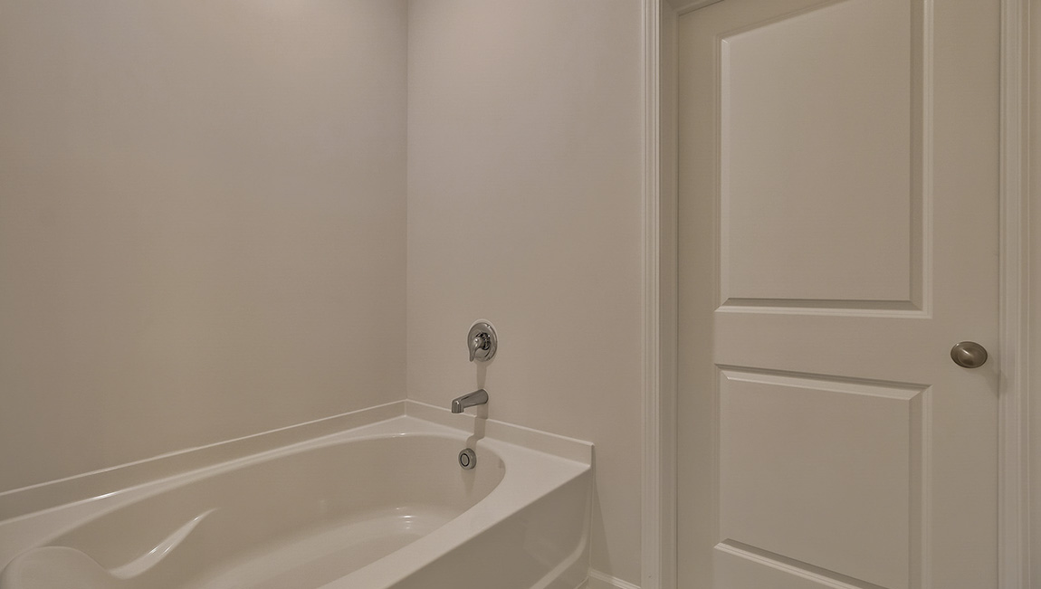 Primary bathroom with standing glass shower