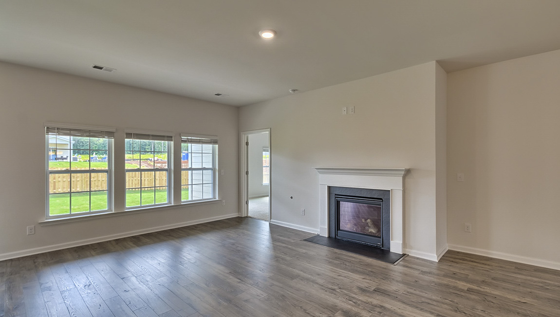 Living room area with windows