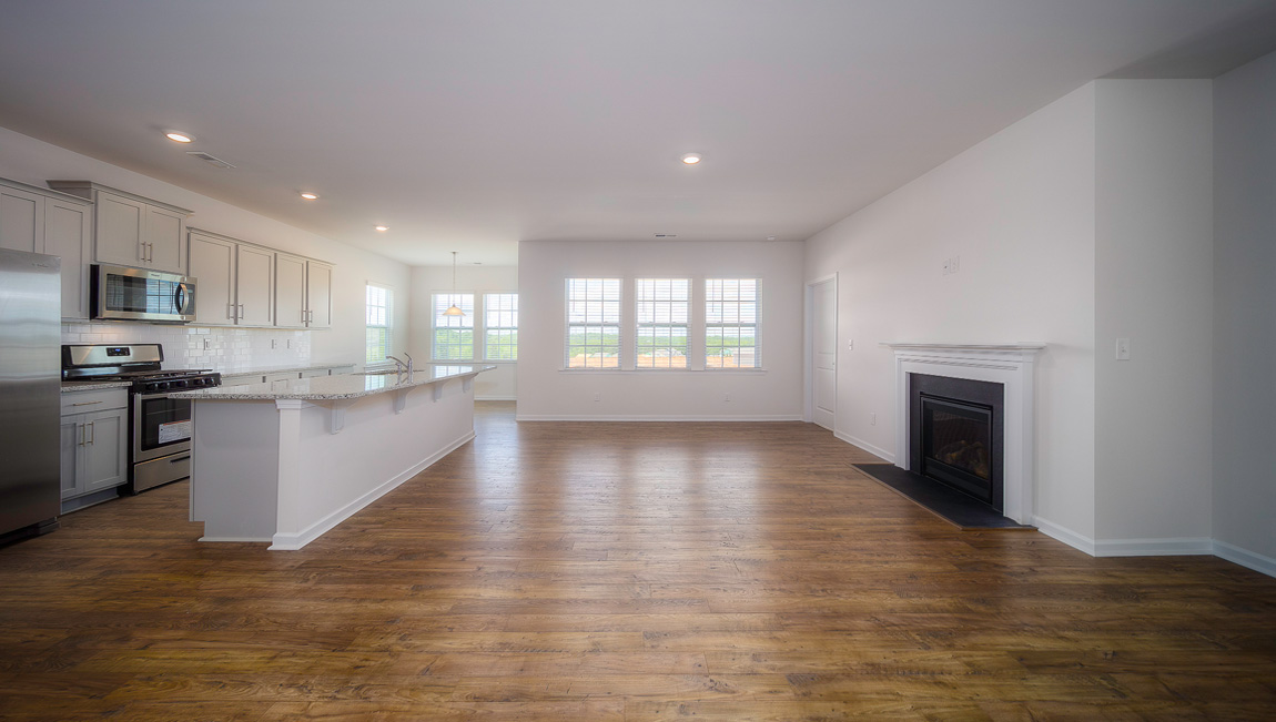 Family room with windows and fireplace